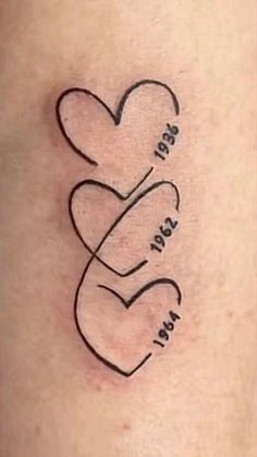 a tattoo with two hearts and the words i miss you