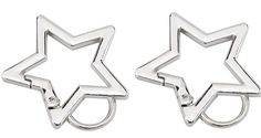 pair of star shaped earrings with diamonds on the bottom and back side, set in white gold