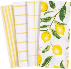 four yellow and white napkins with lemons on them