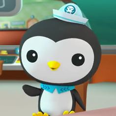 a cartoon penguin is standing in front of a desk with a black and white penguin on it's head