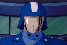 an animated image of a man in a blue suit and helmet looking off into the distance