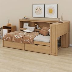 a bed with two drawers underneath it