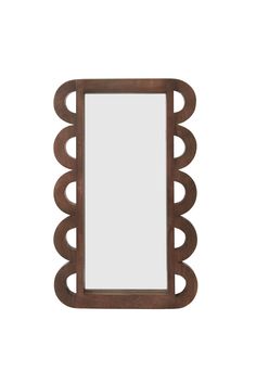 Create an artful, functional home decor scene with the Strause Mirror. Made from mango wood with a dark chocolate stain, this tall rectangular mirror features scalloped trim on the vertical edges & offers a unique pairing of chunky wood with the glass. Lean against a wall or hang up using the securely-attached metal wire in back. Mirror Dimensions: 20" W x 1.5" D x 32" HMaterials: 100% WoodColors: Brown All items subject to availability and should not be assumed as in stock. Contact our customer Two Mirrors In Bathroom, Modern Spanish Decor, Mirror Over Fireplace, Modern Spanish Home, Turtle House, House Mid Century, Wood Frame Mirror, Wood Mirrors, Chocolate Stains