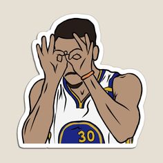 a basketball player holding his hands to his face and covering his eyes with both hands