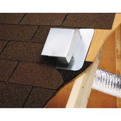 a gutter vent on the roof of a house