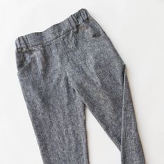 the pants are made out of gray linen