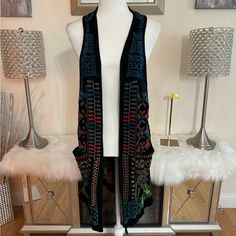 Add A Touch Of Elegance To Your Wardrobe With This Beautiful Johnny Was Biya Embroidered Cardigan Vest. This Sleeveless Sweater Is Perfect For Any Occasion, Whether You're Going Out For A Night On The Town Or Just Running Errands. The Multicolor Design Is Eye-Catching And The Embroidered Accents Add A Unique Touch To The Overall Look. This Cardigan Is A Size Small And Is Designed For Regular Size Types. It Is Made From High-Quality Materials And Is Perfect For Any Fashion-Forward Woman. Make A S Comfortable Sweater, Embroidered Cardigan, Cardigan Vest, Sleeveless Sweater, Johnny Was, Running Errands, Fashion Forward, Going Out, Sweaters For Women