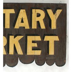 a wooden sign that says mary market on it