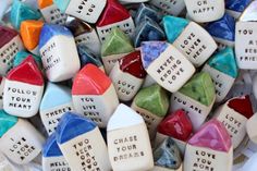 there are many different colored dices that say i love you and they all have words on them