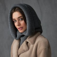 Gray hooded scarf Women snood Knitted hooded scarf The multifunctional winter accessory is made of semi-woolen yarn. The model consists of an elastic collar that covers the neck well and a spacious hood in a textured weave. The elegant accessory has a wide lapel for extra warmth. Leave this snood on after you take off your jacket, it will become a stylish addition to a pullover or sweater. A super soft and cozy hooded scarf. Product details: 70% acrylic, 20 % mohair, 10 %wool Width - 14 in Lengt Knit Bonnet For Winter Cold Weather, Warm Wool Bonnet For Winter, Hooded Warm Winter Bonnet, Warm Wool Winter Bonnet, Warm Hooded Winter Bonnet, Wool Bonnet For Cold Weather, Winter Wool Bonnet For Cold Weather, Hand Knitted Cozy Scarf For Winter, Cozy Knit Scarves For Winter