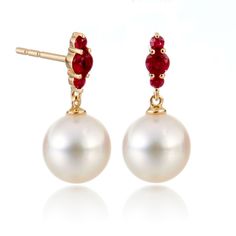 Hovering over a luminous white Akoya pearl, rubies shimmer like the three bright stars of Orion's Belt, rendering these earrings simply out of this world. Since 1861, Gump's has been a destination for jewelry that is distinctive and timeless. To ensure each piece is created to our exacting standards, our expert in-house jewelry team oversees every step of the production process. The result is a statement of pure elegance. White Akoya cultured pearls, 8.5mm. Rubies, 0.30ctw. 14-karat yellow gold. Elegant White Ruby Earrings, Ruby Pearl Earrings, Luxury Red Pearl Earrings Elegant, Red Pearl Drop Round Earrings, Orion Earrings, Exquisite Akoya Pearl Drop Earrings, White Ruby Round Earrings, Exquisite Akoya Pearl Earrings, Ruby And Pearl