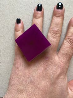 This is an adjustable ring made with epoxi resine, purple, pink and grey mica.  Each piece is unique, handmade fabrication. The resin itself is sealer and water proof but to increase the longevity of the ring band itself the ring should be removed before hand washing and should avoid contact with house hold cleaners.  We strive for 100% customer satisfaction. If any problems are encountered upon receipt, please notify me for a quick and friendly resolution.   Don't forget to make sure your Etsy address is correct as that is where I will ship it to.   Check out the main shop page to browse our full line: http://www.etsy.com/shop/enjoywelrydesign Ring Resin, Huge Rings, Purple Square, Big Ring, Ring Purple, Big Jewelry, Purple Rings, Geometric Heart, Romantic Jewellery