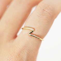 +FREE SHIPPING WTHIN AUSTRALIA OVER $50+ PROMOTION CODE OVER50FREESHIPPING +FREE WORLDWIDE SHIPPING OVER AUD$120+ PROMOTION CODE OVER120FREESHIPPING -Product details- Hand-made solid 14K / 18K gold ring. This ring suits both female and male. This simple and natural design is perfect to layer and pair with other rings.  A great everyday companion. The ring is highly polished as shown in the photo.  *This is a hand made to order item. It will take 5-9 working days to make and polish it. Her Banana Everyday Yellow Gold Wavy Jewelry, Everyday Wavy Yellow Gold Jewelry, Gold Wavy Jewelry For Everyday, Minimalist Wavy Yellow Gold Jewelry, Minimalist Wavy Rings For Gift, Minimalist Wavy Rings As A Gift, Minimalist Wavy Rings As Gifts, Ocean Rings, Wave Rings