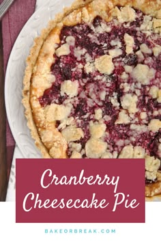 a cranberry cheesecake pie on a white plate with the words cranberry cheesecake pie above it