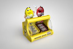 a yellow candy machine with two different types of candies