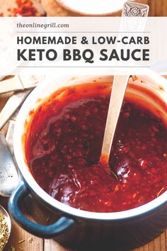 the best keto bbq sauce in a pot with spoons and spices around it