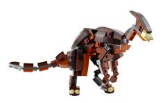 a toy dinosaur made out of legos on a white background