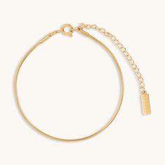 Slim, sleek, and chic–our mini Snake Chain Bracelet is everything you want in an everyday piece of jewelry. Stack it with our larger Snake Chain Bracelet or wear it solo for just a hint of gold. Metal: 18k PVD gold plated over steel Length: 6 inches + a 2-inch adjustable extender Width: 1mm Hypoallergenic Waterproof Tarnish-free Different Than Others, Jewelry Stack, Largest Snake, Snake Chain Bracelets, Snake Bracelet, Waterproof Jewelry, Snake Chain, Piercing Jewelry, Jewelry Plate