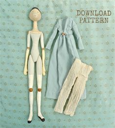 the doll is wearing a blue dress and white tights