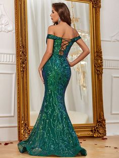 Product Code:FSWD1217 Embellishment: Sequin Fabric: 100% Polyester Back Style: Zipper Up Fully Lined: Yes Built-in Bra: Yes Available Color: Dark green Stretch: Moderate Fits true to size Imported Model Information: Height: 5' 2" Bust: 33.5'' Waist: 24“ Hips: 35.5” wearing US size Small Fitted Green Mermaid Dress For Gala, Green Mermaid Dress With Sweep Train, Fitted Green Mermaid Dress For Evening, Green Mermaid Dress For Gala During Prom Season, Glamorous Green Mermaid Dress With Sweep Train, Green Mermaid Dress For Prom Season, Green Mermaid Dress For Prom, Glamorous Green Mermaid Dress, Green Floor-length Mermaid Dress For Formal Occasions