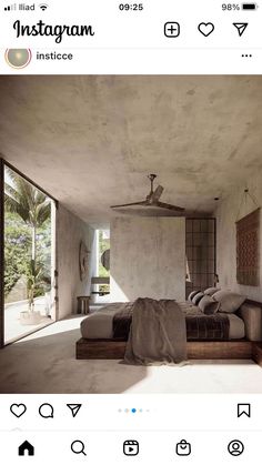 the instagram page shows an image of a bedroom with concrete walls and flooring