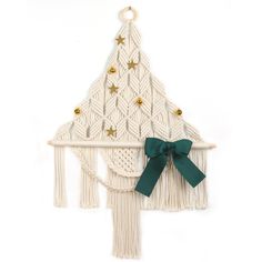 a christmas tree made out of yarn with green ribbon and gold stars on the top