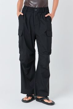 Our Baggy Cargo Pants are stylish and comfortable! Crafted with a baggy fit and high rise waist they provide you with plenty of space to move. The cargo-style pockets are functional and stylish perfect for storing all your essentials. Made from premium quality material these trousers are durable and long-lasting. Get ready to take on any adventure with ease with these Cargo Pants! Cargo style Baggy fit High rise waisted Pockets Button closure Elastic band at waist Hand wash cold Do not bleach Do Jumpsuit Fall, Knitwear Trends, Baggy Cargo Pants, Pants Cargo, Denim Sweater, Cargo Style, Blouse Pants, Blazer And Shorts, Tweed Dress