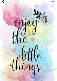 the words enjoy the little things on a watercolor background