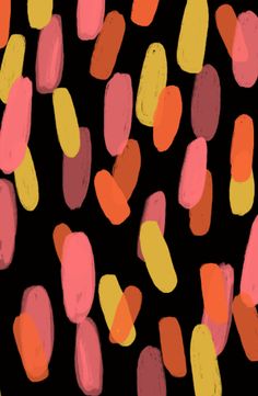 an image of colorful candy corn pattern on blue background with orange, pink and yellow colors