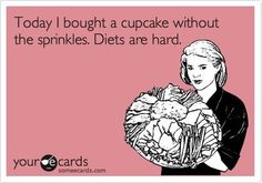 a woman holding a bunch of food with the caption today i bought a cupcake without the sprinkles, diets are hard