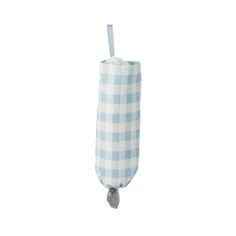 a blue and white checkered bag hanging from a hook