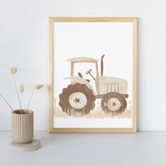 a painting of a tractor is shown next to a vase