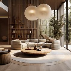 a living room filled with lots of furniture next to tall glass windows and wooden shelves