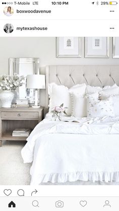 a bed with white sheets and pillows in a bedroom next to two framed pictures on the wall