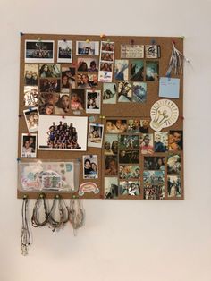 a bulletin board covered in pictures and magnets hanging on a wall next to a clock