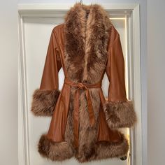 Bohemian Gig Faux Fur Coat Sold Out! New-Never Used. It’s Been Sitting In My Closet And Deserves A Good Home! It’s Absolutely Stunning!!!! Please Look At Pictures For A Better Description. Details: It Has A Faux Fur Construction, Dual Pockets, And A Waist Tie Belt. 75% Rayon 25% Polyurethane Hand Wash Cold, Hang Dry All Proceeds Go Towards The Care Of My Foster Kittens. Help Me Save More Lives. Foster Kittens, Long Coat Women, Coat Women, Brigitte Bardot, Faux Fur Coat, Trench Coats, Tie Belt, Dolls Kill, Long Coat