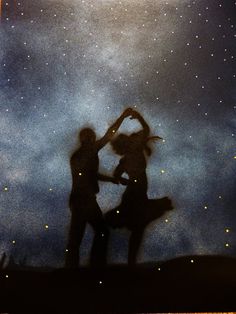 two people are dancing under the stars in the sky