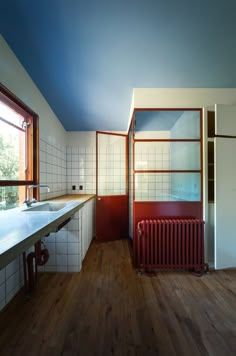 an instagram photo of a bathroom with wood flooring