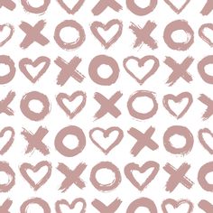 pink hearts and crosses drawn on white paper