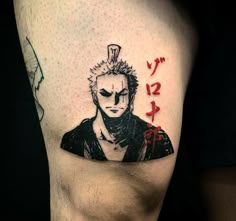 a man's leg with an anime character tattoo on it