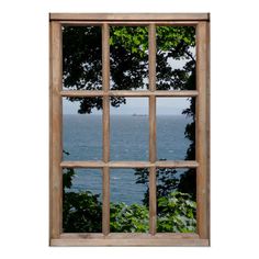 an open window with trees and water in the background