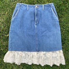 This is a vintage 80s- 90s St Johns Bay denim skirt Tag size is 10 Material is 100% cotton  And I'm pretty sure the lace was custom added Skirts in great condition  It's knee length and has front pockets Measurements as follows: Waist laying flat is 15" inches  Hips are 20" inches laying flat  Length is 23" inches  I ship priority mail with tracking! Thanks for looking :) Vintage Cotton Denim Skirt With Frayed Hem, Vintage Denim Skirt With Frayed Hem, Vintage Fitted Denim Skirt With Frayed Hem, Fitted Vintage Denim Skirt With Frayed Hem, Fitted Denim Bottoms With Lace Trim, Denim And Lace, Vintage Denim, Denim Skirt, Lace Skirt