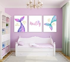 two paintings on the wall above a white daybed in a girls'room with purple walls