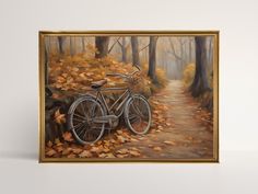 an oil painting of a bicycle parked on a path in the woods with fallen leaves