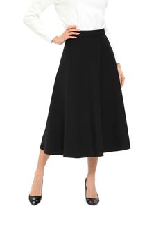 This classic black knee-length skirt is the perfect addition to any wardrobe. Its simple and timeless design makes it versatile and easy to wear for any occasion. The skirt falls at the knee, making it an appropriate and modest length. The A-line cut of the skirt creates a flattering silhouette and comfortable fit. It is made with a lightweight and breathable fabric that will keep you cool and comfortable all day long. It is available in sizes XS to XL, and with a length of 31 inches, it can acc Chic A-line Maxi Skirt For Work, Classic Black A-line Skirt, Elegant Black A-line Skirt, Black A-line Relaxed Fit Skirt, Elegant A-line Maxi Skirt For Work, Black A-line Pleated Skirt, Knee-length Maxi Skirt For Workwear In Fall, Elegant Black A-line Pleated Skirt, Relaxed A-line Office Skirt