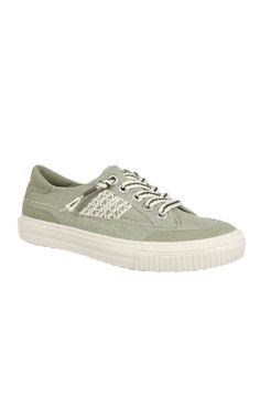 a women's green sneaker with white laces