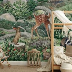 a bedroom with a deer mural on the wall