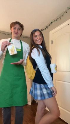 a man and woman dressed up in costumes