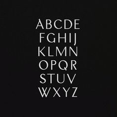 the alphabet is made up of letters and numbers in white on a black background,