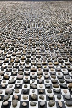 rocks are arranged in the shape of a checkerboard pattern